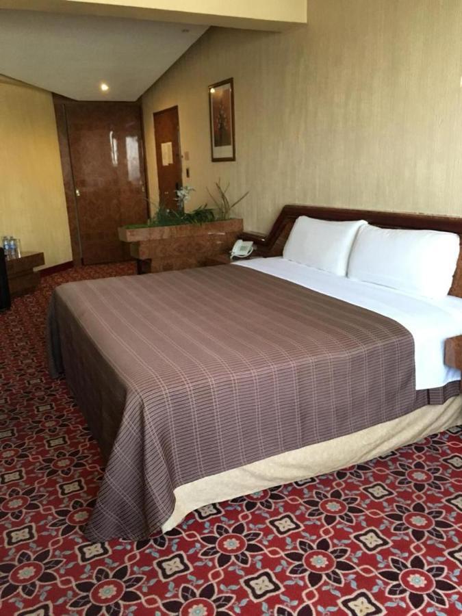 Hotel Escala Central Del Norte Mexiko-Stadt Zimmer foto